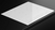 Placa de inducción blanca Teka IZC 64630 de 60 cm, con superficie lisa y controles táctiles.