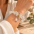 Pulseira de Quartzo Cristal Natural com Pingente Coração – Clareza, Proteção e Harmonização Energética