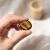 Olho de Tigre Rolado Natural 3 cm – Proteção, Coragem e Foco - comprar online