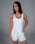 Macaquinho Vibe Shine Branco - Alta compressão, Forro interno, Bolsos laterais - Fira Fitwear