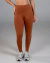 Calça Shape Soft Plus Marrom - Bolsos laterais, Cós largo, Baixa compressão