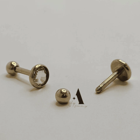 Barbell modelo liso australiano com pedra central aço pvd gold A0647