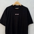 Camiseta Oversized Stranger “Just Confused Fans” (Preta) - loja online