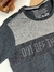 Camiseta masculina infantil manga curta da marca Gangster, com detalhes em malha e a frase "OUT OFF THE" em destaque.