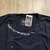 Camisa Armani em Malha Premium com Logo Escrito Acompanhando a Gola