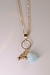 Colar Amor de Mãe com Menino e Água Marinha Banho Ouro - comprar online