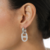 Brinco Argola Insp G Cravejado Banhado a Ouro 18k e Ródio Branco - comprar online