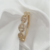 Bracelete Insp CD Luxo Cravejado Banhado a Ouro 18k e Ródio Branco na internet