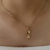 Imagem do Pingente Filho Liso Pontinho de Cravejação Banhado a Ouro 18k