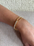 Pulseira folheada cordão fino e zirconia dourada - comprar online