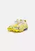 Botines Puma Future Ultimate FG Color Gris y Amarillo - tienda online