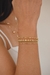 BRACELETE ESFERAS AJUSTAVEL DOURADO na internet