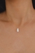 COLAR FIO DE NYLON COM MENINO EM MADRE PÉROLA