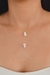 COLAR FIO DE NYLON COM MENINA EM MADRE PÉROLA na internet