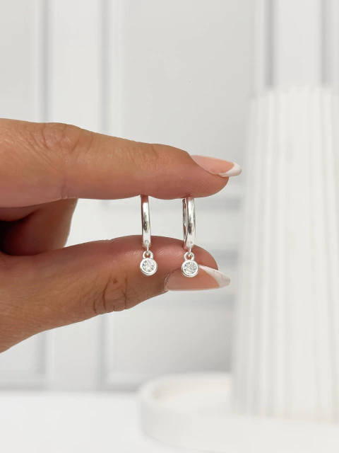 HUGGIES LISOS DIJE MINI PUNTO DE LUZ PLATA 925 - comprar online