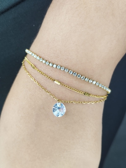 Pulseira Tripla com Ponto de Luz Corrente e Riviera em Aço Dourado