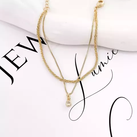 Pulseira dupla shine dourada
