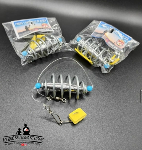 Línea M&M Feeder lastrado, diseñada especialmente para la apasionante pesca de carpas. Equipada con plomo interno y un resorte grande que asegura una sujeción óptima, esta línea está diseñada para ofrecer precisión y estabilidad durante cada lance. La com