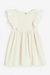 Vestido volados crudo H&M