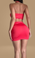 Vestido Marshal de color rojo, con un diseño ajustado que resalta la figura, visto desde atrás.