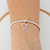 Berloque Menina Cravejada Rosa - comprar online