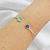 Bracelete Fio Redondo Pedra Verde e Azul Regulável - comprar online