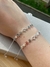 PULSEIRA FLORES COM CORAÇÃO VAZADO CRAVEJADO - S00137C - comprar online