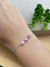 PULSEIRA FLOR ROSA MODELO GRAVATINHA - 500582TR