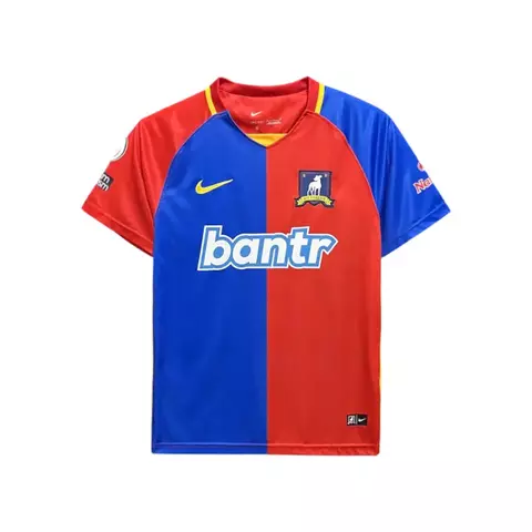 Camisa AFC Richmond Home I 23/24 masculina da Nike, azul e vermelha com detalhes amarelos, com logo do time e patrocínio bantr