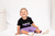 CAMISETA INFANTIL PRETA C/ ROXO