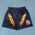 Eric Emanuel Black/Yellow Ray Shorts na internet