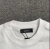 Imagem do Camiseta Amiri Bar Logo Branca/Azul