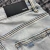 Calça Amiri Jeans Skinny Destroyed Strass - Loja Wild Drip - Vista-se como seu artista favorito.