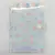 Caderno Brochura com Folhas Ilustradas Adorable Creature to Arrive - Pensei Presentes