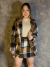 Imagem do Conjunto Xadrez Blazer e Shorts Saia