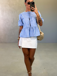 Blusa Justine na internet