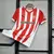 Camisa Sporting de Gijon I 2024/25 Torcedor Masculina - Vermelha e Branca - Fanzone | Futebol & Tradição