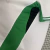 Camisa branca do torcedor masculino da seleção da Nigéria, com detalhes em verde e o logo da Nike.