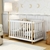 Berço Curvo Mini Cama Ana Liz Branco com Madeira Carolina Baby em quarto infantil decorado.