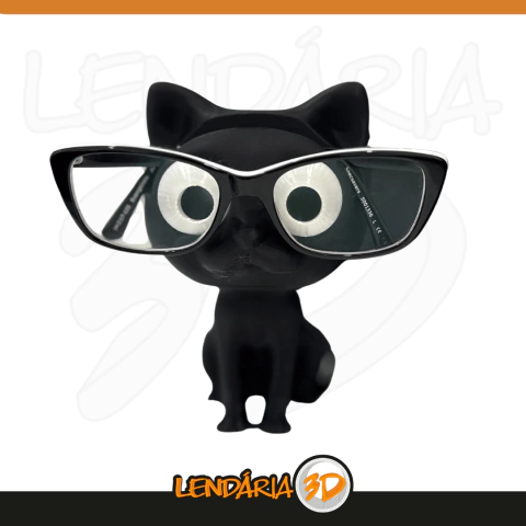 Suporte para óculos em formato de gato preto, segurando óculos grandes e com olhos expressivos.
