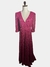 Vestido Tularosa na cor rosa, com decote em V e mangas longas. Estilo elegante e feminino, ideal para ocasiões especiais.