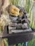 Cascada de Buda con rostro que simula tallado en piedra - Feng Shui - 26 cm - Alma Regalos