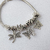Pulsera Dora con Dijes - Mariposas y Libélula PAR252 - comprar online