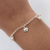 Pulsera Laminada en Plata 1000 – Perlitas y Corazon PAB005