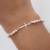 Pulsera Laminada en Plata 1000 – Cruz con Perla PAB016