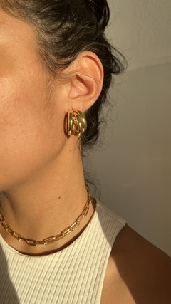 Choker Elos Carteir G, banhada ouro na internet