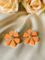 Brinco Resinado Flor Margarida na internet