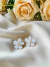 Brinco Flor Resinado Com Pérola - comprar online