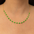 CHOKER DOURADA INSP RESINA VERDE