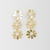 Brinco Três Flores com Pérola Dourado - comprar online